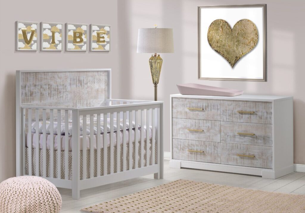 Vibe-Collection-Convertible-Crib-Double-Dresser-in-white-with-white-bark-antique-brass-pulls-featuring-Matty-in-soft-pink